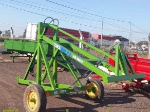 Elevador de rollos con cilindro de cabec